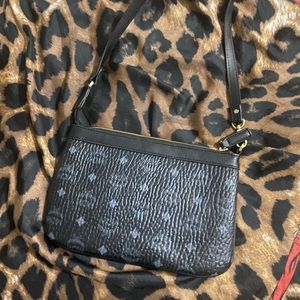 MCM small handbag black in good condition normal wear